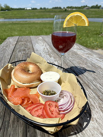 Picture of bagel basket and a glass of sangria